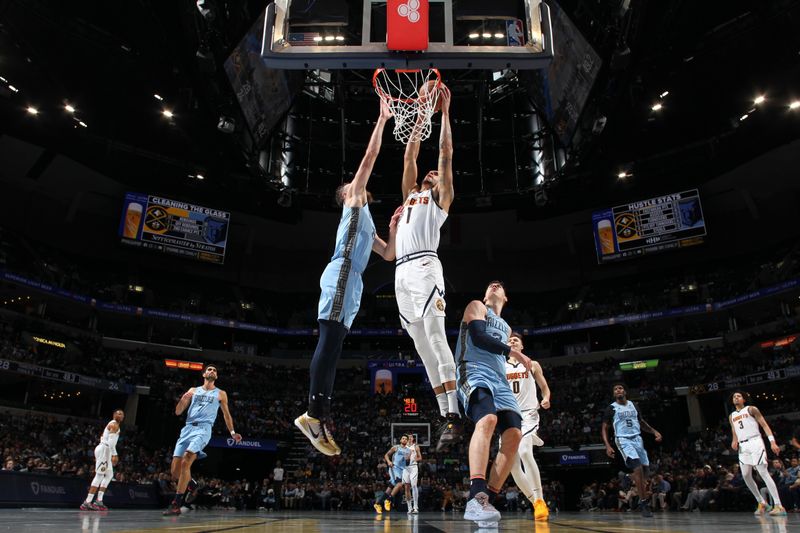 MEMPHIS, TN - NOVEMBER 19: Michael Porter Jr. #1 of the Denver Nuggets drives to the basket during the game against the Memphis Grizzlies during the Emirates NBA Cup game on November 19, 2024 at FedExForum in Memphis, Tennessee. NOTE TO USER: User expressly acknowledges and agrees that, by downloading and or using this photograph, User is consenting to the terms and conditions of the Getty Images License Agreement. Mandatory Copyright Notice: Copyright 2024 NBAE (Photo by Joe Murphy/NBAE via Getty Images)