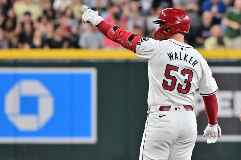 Sep 25, 2024; Phoenix, Arizona, USA; Arizona Diamondbacks first base Christian Walker (53) celebrates a double in the second inning against the San Francisco Giants at Chase Field. Mandatory Credit: Matt Kartozian-Imagn Images