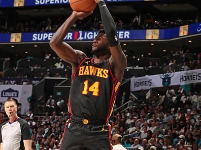 CHARLOTTE, NC - OCTOBER 25: AJ Griffin #14 of the Atlanta Hawks shoots a three point basket during the game against the Charlotte Hornets on October 25, 2023 at Spectrum Center in Charlotte, North Carolina. NOTE TO USER: User expressly acknowledges and agrees that, by downloading and or using this photograph, User is consenting to the terms and conditions of the Getty Images License Agreement. Mandatory Copyright Notice: Copyright 2023 NBAE (Photo by Kent Smith/NBAE via Getty Images)