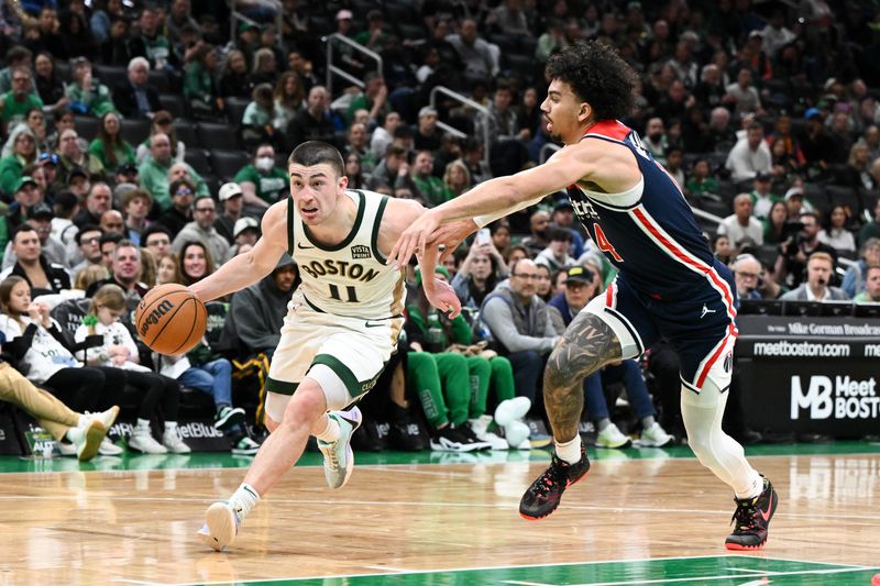 BOSTON, MASSACHUSETTS - APRIL 14: Payton Pritchard #11 of the Boston Celtics drives to the basket against Jules Bernard #14 of the Washington Wizards during the fourth quarter at the TD Garden on April 14, 2024 in Boston, Massachusetts. NOTE TO USER: User expressly acknowledges and agrees that, by downloading and or using this photograph, User is consenting to the terms and conditions of the Getty Images License Agreement. (Photo by Brian Fluharty/Getty Images)