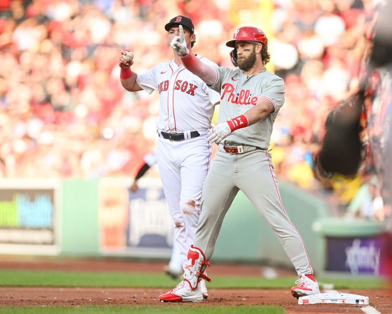 Jun 12, 2024; Boston, Massachusetts, USA; Philadelphia Phillies first base Bryce Harper (3) reacts after hitting a RBI single against the Boston Red Sox during the first inning at Fenway Park. Mandatory Credit: Brian Fluharty-USA TODAY Sports