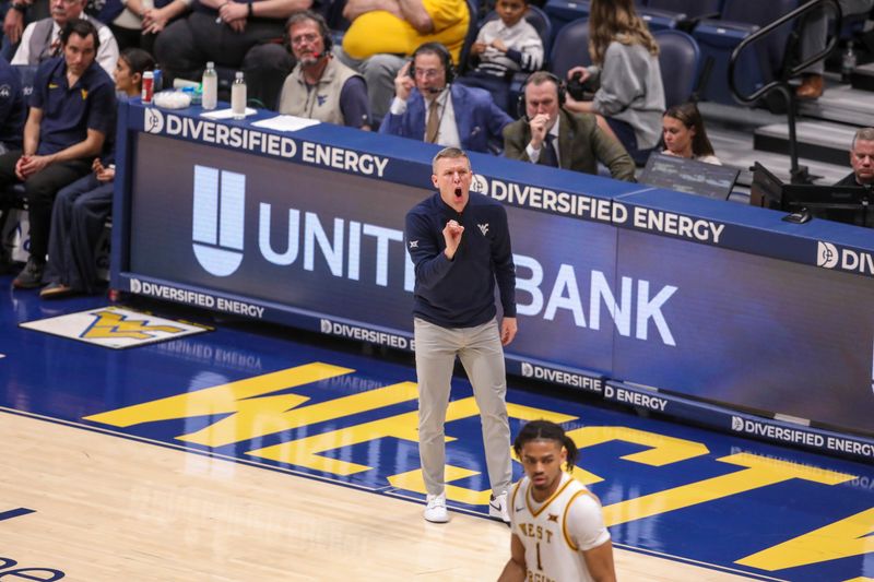 Mar 6, 2026; Morgantown, West Virginia, USA; West Virginia Mountaineers head coach Ross Hodge yells from the sideline during the first half against the UCF Knights at Hope Coliseum. Mandatory Credit: Ben Queen-Imagn Images