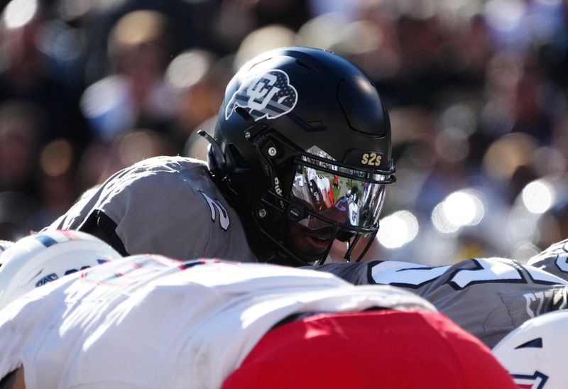 Nov 11, 2023; Boulder, Colorado, USA; Colorado Buffaloes quarterback Shedeur Sanders (2) takes the snap against the Arizona Wildcats in the second quarter at Folsom Field. Mandatory Credit: Ron Chenoy-USA TODAY Sports