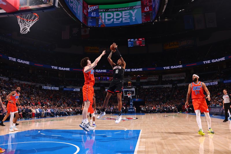 OKLAHOMA CITY, OK - MARCH 27:  Jabari Smith Jr. #10 of the Houston Rockets shoots the ball during the game against the Oklahoma City Thunder on March 27, 2024 at Paycom Arena in Oklahoma City, Oklahoma. NOTE TO USER: User expressly acknowledges and agrees that, by downloading and or using this photograph, User is consenting to the terms and conditions of the Getty Images License Agreement. Mandatory Copyright Notice: Copyright 2024 NBAE (Photo by Zach Beeker/NBAE via Getty Images)