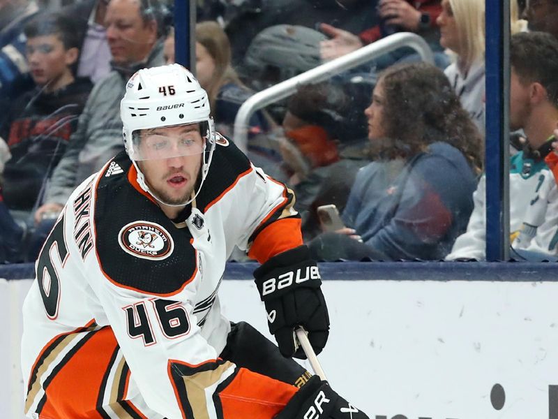 Oct 24, 2023; Columbus, Ohio, USA; Anaheim Ducks defenseman Ilya Lyubushkin (46) controls the puck during the second period against the Columbus Blue Jackets at Nationwide Arena. Mandatory Credit: Joseph Maiorana-USA TODAY Sports