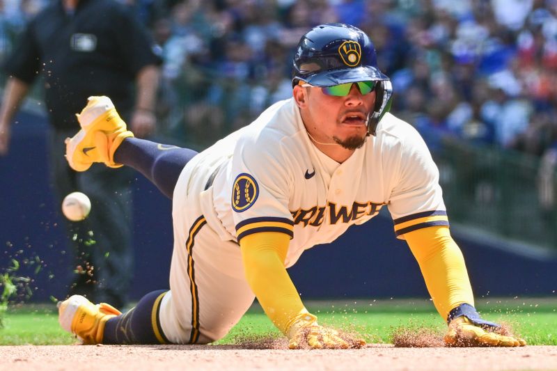 Jun 8, 2023; Milwaukee, Wisconsin, USA; Milwaukee Brewers catcher William Contreras (24) advances to third base after a flyout in the sixth inning against the Baltimore Orioles at American Family Field. Mandatory Credit: Benny Sieu-USA TODAY Sports