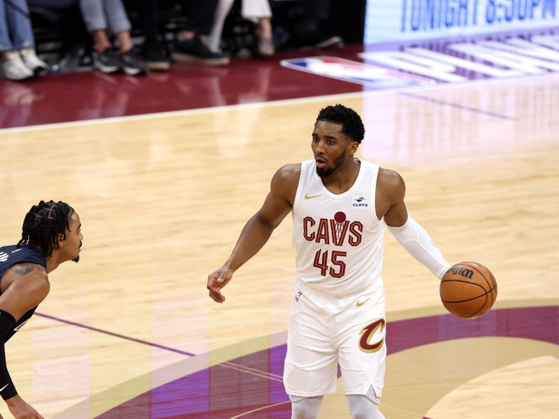 CLEVELAND, OH - APRIL 20: Donovan Mitchell #45 of the Cleveland Cavaliers handles the ball during Round One Game One of the 2024 NBA Playoffs against the Orlando Magic on April 20, 2024 at Rocket Mortgage FieldHouse in Cleveland, Ohio. NOTE TO USER: User expressly acknowledges and agrees that, by downloading and/or using this Photograph, user is consenting to the terms and conditions of the Getty Images License Agreement. Mandatory Copyright Notice: Copyright 2024 NBAE (Photo by  Lauren Leigh Bacho/NBAE via Getty Images)