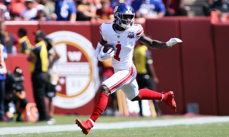 New York Giants wide receiver Malik Nabers (1) makes a catch during an NFL football game against the Washington Commanders, Sunday, September 15, 2024 in Landover. (AP Photo/Daniel Kucin Jr.)