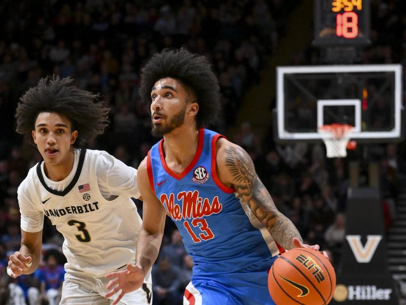 Jan 31, 2026; Nashville, TN, USA;  Mississippi Rebels guard Kezza Giffa (13) drives to the basket against the Vanderbilt Commodoresduring the first half at Memorial Gymnasium. Mandatory Credit: Steve Roberts-Imagn Images