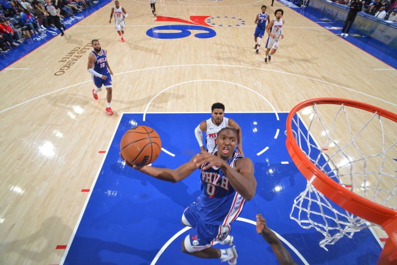 PHILADELPHIA, PA - OCTOBER 30: Tyrese Maxey #0 of the Philadelphia 76ers drives to the basket during the game against the Detroit Pistons on October 30, 2024 at the Wells Fargo Center in Philadelphia, Pennsylvania NOTE TO USER: User expressly acknowledges and agrees that, by downloading and/or using this Photograph, user is consenting to the terms and conditions of the Getty Images License Agreement. Mandatory Copyright Notice: Copyright 2024 NBAE (Photo by Jesse D. Garrabrant/NBAE via Getty Images)