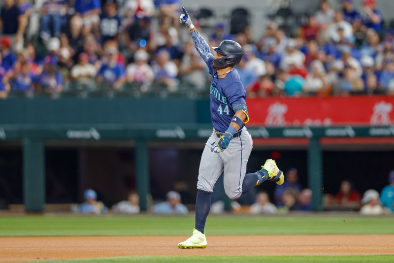 Sep 21, 2024; Arlington, Texas, USA; Seattle Mariners outfielder Julio Rodríguez (44) hits a home run on the first pitch of the game against the Texas Rangers at Globe Life Field. Mandatory Credit: Andrew Dieb-Imagn Images