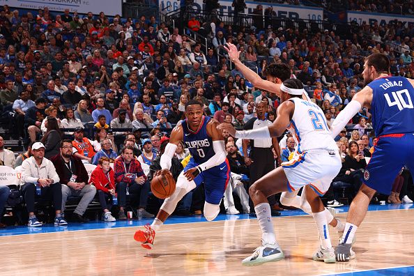 OKLAHOMA CITY, OK - DECEMBER 21: Russell Westbrook #0 of the LA Clippers drives to the basket during the game against the Oklahoma City Thunder on December 21, 2023 at Paycom Arena in Oklahoma City, Oklahoma. NOTE TO USER: User expressly acknowledges and agrees that, by downloading and or using this photograph, User is consenting to the terms and conditions of the Getty Images License Agreement. Mandatory Copyright Notice: Copyright 2023 NBAE (Photo by Zach Beeker/NBAE via Getty Images)