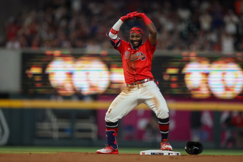 Apr 26, 2024; Atlanta, Georgia, USA; Atlanta Braves center fielder Michael Harris II (23) celebrates after a RBI double against the Cleveland Guardians in the fourth inning at Truist Park. Mandatory Credit: Brett Davis-USA TODAY Sports
