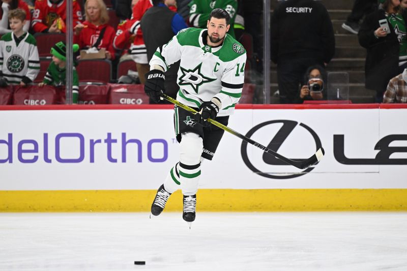 Jan 13, 2024; Chicago, Illinois, USA;  Dallas Stars forward Jamie Benn (14) warms up before a game against the Chicago Blackhawks at United Center. Mandatory Credit: Jamie Sabau-USA TODAY Sports