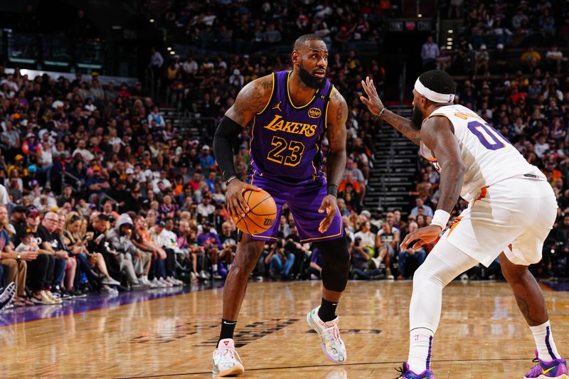 PHOENIX, AZ - OCTOBER 28: LeBron James #23 of the Los Angeles Lakers dribbles the ball during the game against the Phoenix Suns on October 28, 2024 at Footprint Center in Phoenix, Arizona. NOTE TO USER: User expressly acknowledges and agrees that, by downloading and or using this photograph, user is consenting to the terms and conditions of the Getty Images License Agreement. Mandatory Copyright Notice: Copyright 2024 NBAE (Photo by Kate Frese/NBAE via Getty Images)