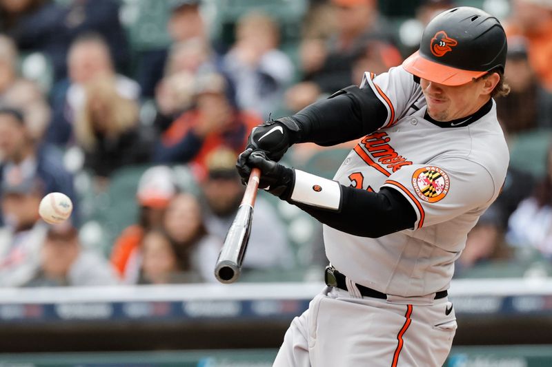 Apr 30, 2023; Detroit, Michigan, USA;  Baltimore Orioles catcher Adley Rutschman (35) hits a double in the third inning against the Detroit Tigers at Comerica Park. Mandatory Credit: Rick Osentoski-USA TODAY Sports