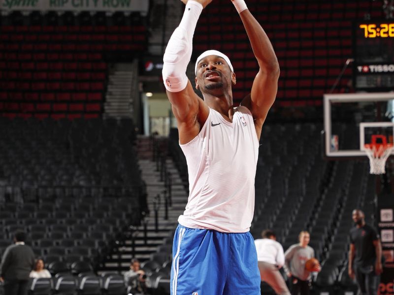 PORTLAND, OR - JANUARY 26: Shai Gilgeous-Alexander #2 of the Oklahoma City Thunder warms up before the game against the Portland Trail Blazers on January 26, 2025 at the Moda Center Arena in Portland, Oregon. NOTE TO USER: User expressly acknowledges and agrees that, by downloading and or using this photograph, user is consenting to the terms and conditions of the Getty Images License Agreement. Mandatory Copyright Notice: Copyright 2025 NBAE (Photo by Cameron Browne/NBAE via Getty Images)