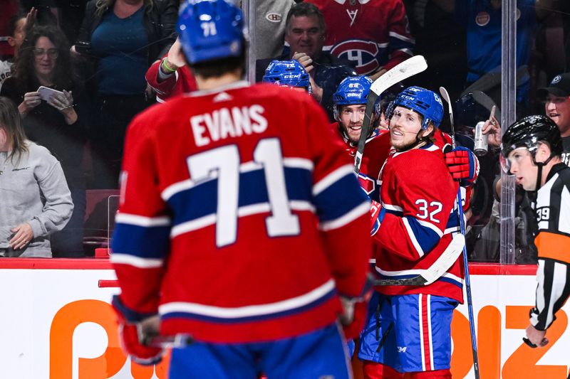 Oct 22, 2022; Montreal, Quebec, CAN; Montreal Canadiens left wing Mike Hoffman (68) celebrates with teammates after scoring a goal against the Dallas Stars during the first period at Bell Centre. Mandatory Credit: David Kirouac-USA TODAY Sports