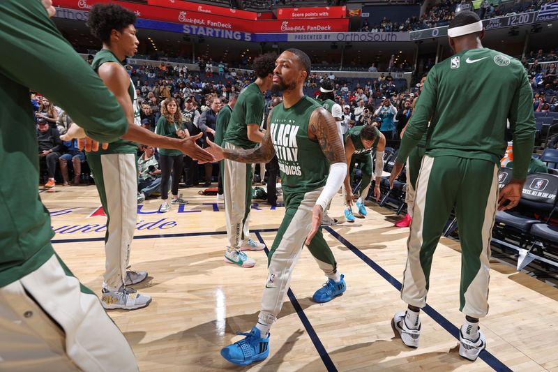 MEMPHIS, TN - FEBRUARY 15: Damian Lillard #0 of the Milwaukee Bucks is introduced before the game against the Memphis Grizzlies on February 15, 2024 at FedExForum in Memphis, Tennessee. NOTE TO USER: User expressly acknowledges and agrees that, by downloading and or using this photograph, User is consenting to the terms and conditions of the Getty Images License Agreement. Mandatory Copyright Notice: Copyright 2024 NBAE (Photo by Stephen Gosling/NBAE via Getty Images)