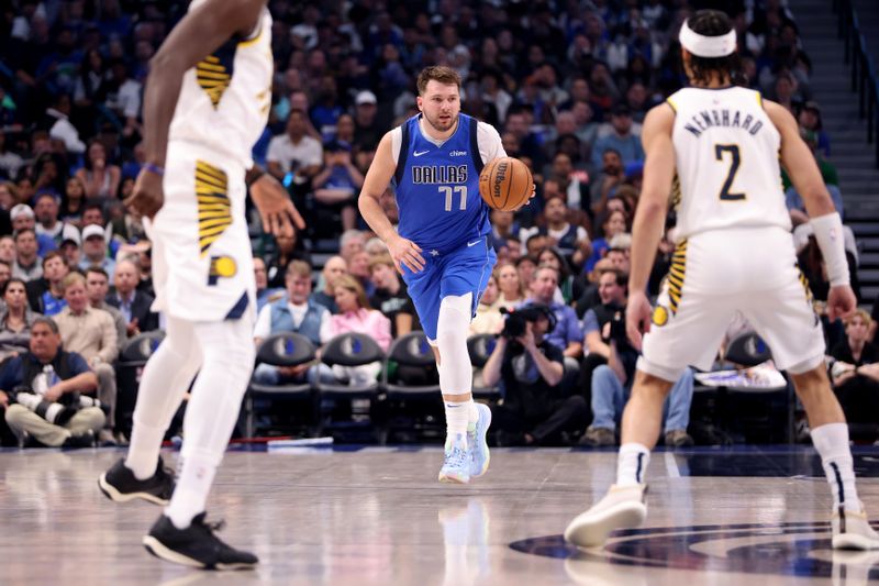 DALLAS, TEXAS - MARCH 05: Luka Doncic #77 of the Dallas Mavericks dribbles the ball up court against the Indiana Pacers in the first half at American Airlines Center on March 05, 2024 in Dallas, Texas. NOTE TO USER: User expressly acknowledges and agrees that, by downloading and or using this photograph, User is consenting to the terms and conditions of the Getty Images License Agreement. (Photo by Tim Heitman/Getty Images)