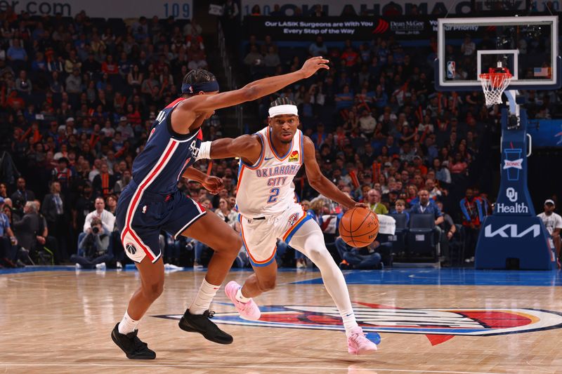 OKLAHOMA CITY, OK - FEBRUARY 23: Shai Gilgeous-Alexander #2 of the Oklahoma City Thunder handles the ball during the game against the Washington Wizards on February 23, 2024 at Paycom Arena in Oklahoma City, Oklahoma. NOTE TO USER: User expressly acknowledges and agrees that, by downloading and or using this photograph, User is consenting to the terms and conditions of the Getty Images License Agreement. Mandatory Copyright Notice: Copyright 2024 NBAE (Photo by Zach Beeker/NBAE via Getty Images)