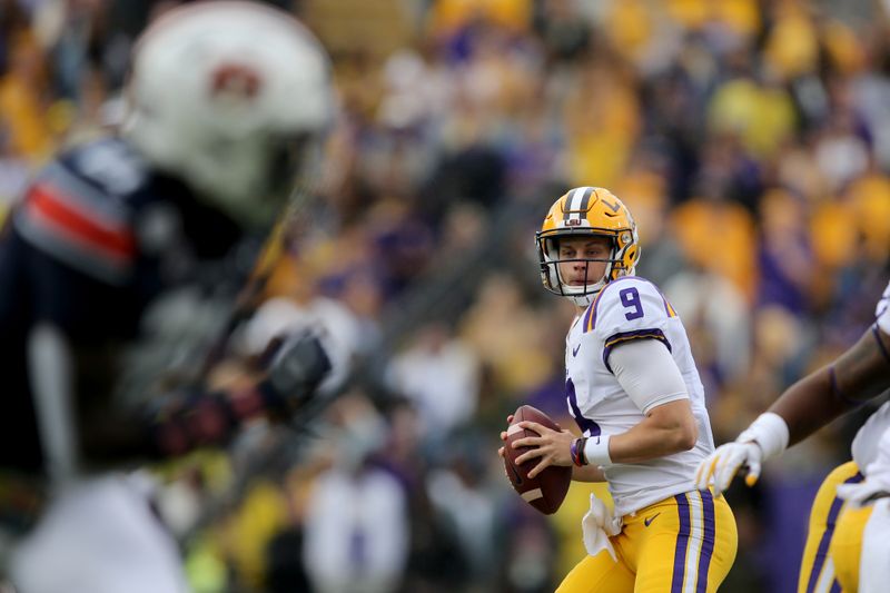 Oct 26, 2019; Baton Rouge, LA, USA; LSU Tigers quarterback Joe Burrow (9) looks to throw against the Auburn Tigers in the first quarter at Tiger Stadium. Mandatory Credit: Chuck Cook-USA TODAY Sports