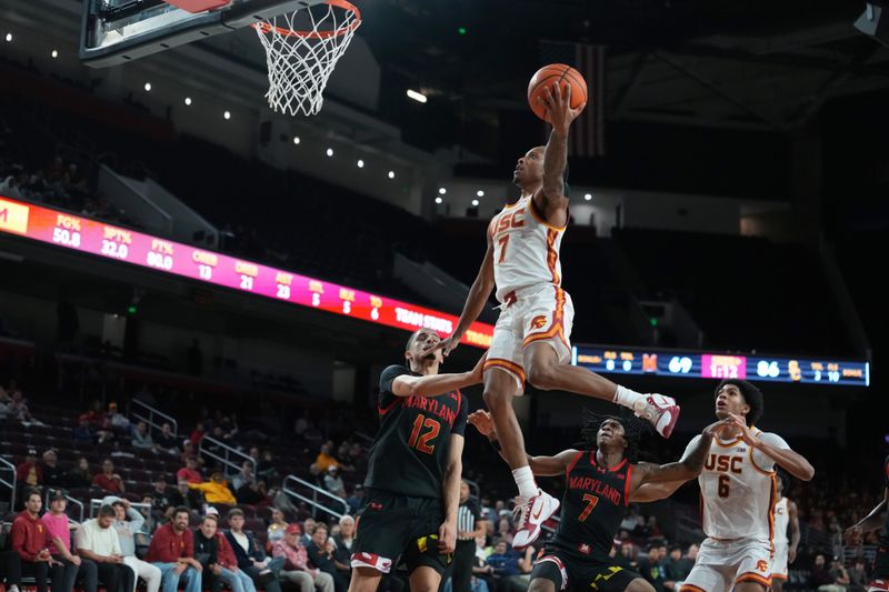 Jan 13, 2026; Los Angeles, California, USA; Southern California Trojans guard Jordan Marsh (7) shoots the ball against the Maryland Terrapins in the second half at Galen Center. Mandatory Credit: Kirby Lee-Imagn Images