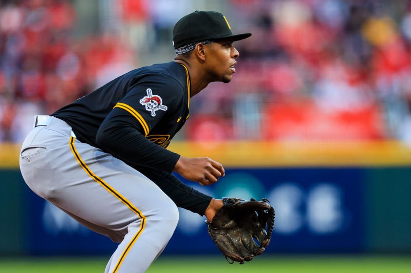 Apr 12, 2025; Cincinnati, Ohio, USA; Pittsburgh Pirates third baseman Ke'Bryan Hayes (13) prepares for the pitch in the third inning against the Cincinnati Reds at Great American Ball Park. Mandatory Credit: Katie Stratman-Imagn Images