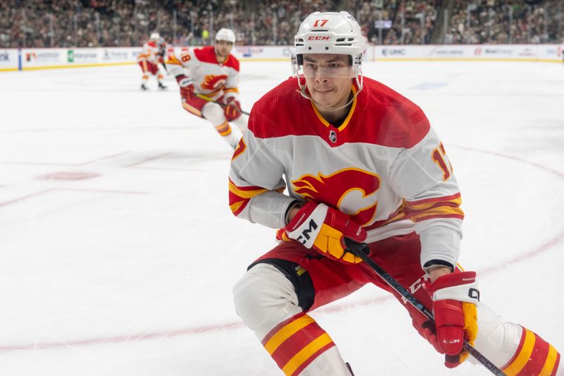 Dec 14, 2023; Saint Paul, Minnesota, USA; Calgary Flames center Yegor Sharangovich (17) in the first period against the Minnesota Wild at Xcel Energy Center. Mandatory Credit: Matt Blewett-USA TODAY Sports