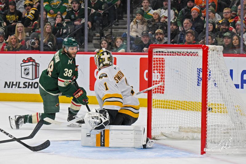 Dec 14, 2025; Saint Paul, Minnesota, USA; Minnesota Wild forward Ryan Hartman (38) scores a power play goal against the Boston Bruins during the second period at Grand Casino Arena. Mandatory Credit: Nick Wosika-Imagn Images
