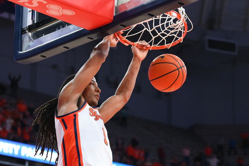 Nov 14, 2023; Syracuse, New York, USA; Syracuse Orange forward Maliq Brown (1) dunks the ball against the Colgate Raiders during the second half at the JMA Wireless Dome. Mandatory Credit: Rich Barnes-USA TODAY Sports