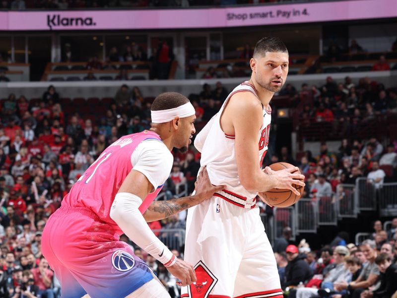 CHICAGO, IL - FEBRUARY 26: Nikola Vucevic #9 of the Chicago Bulls handles the ball during the game against the Washington Wizards on February 26, 2023 at United Center in Chicago, Illinois. NOTE TO USER: User expressly acknowledges and agrees that, by downloading and or using this photograph, User is consenting to the terms and conditions of the Getty Images License Agreement. Mandatory Copyright Notice: Copyright 2023 NBAE (Photo by Jeff Haynes/NBAE via Getty Images)