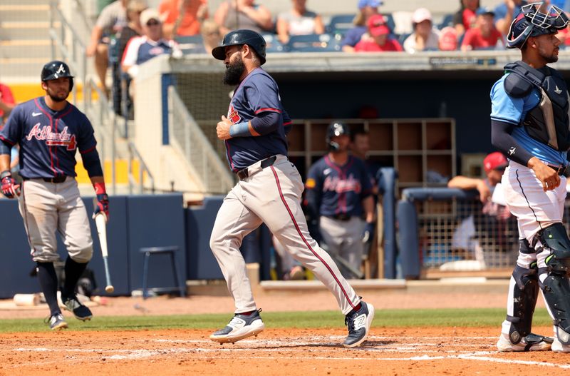 Mar 18, 2024; Port Charlotte, Florida, USA; Atlanta Braves second baseman Luis Guillorme (15) scores a run during the third inning against the Tampa Bay Rays  at Charlotte Sports Park. Mandatory Credit: Kim Klement Neitzel-USA TODAY Sports