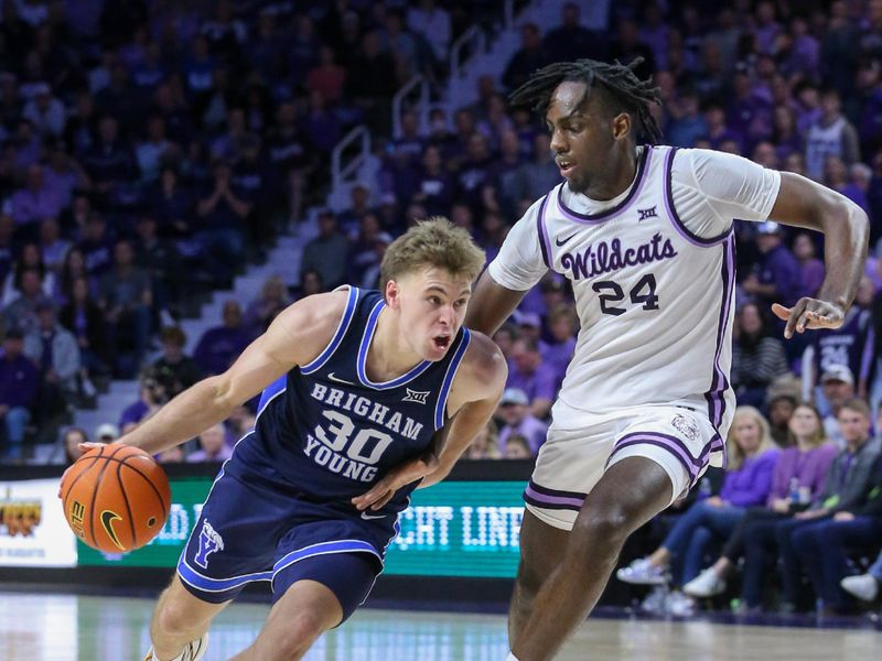 Feb 24, 2024; Manhattan, Kansas, USA; Brigham Young Cougars guard Dallin Hall (30) dribbles against Kansas State Wildcats forward Arthur Maluma (24) during the second half at Bramlage Coliseum. Mandatory Credit: Scott Sewell-USA TODAY Sports