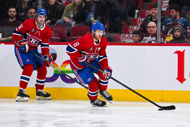 Jan 15, 2024; Montreal, Quebec, CAN; Montreal Canadiens defenseman Mike Matheson (8) plays the puck against the Colorado Avalanche during the third period at Bell Centre. Mandatory Credit: David Kirouac-USA TODAY Sports