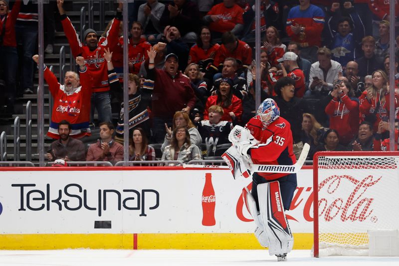 Oct 16, 2023; Washington, District of Columbia, USA; Washington Capitals goaltender Darcy Kuemper (35) celebrates after making the game winning save on Calgary Flames center Nazem Kadri (not pictured) in a shootout at Capital One Arena. Mandatory Credit: Geoff Burke-USA TODAY Sports