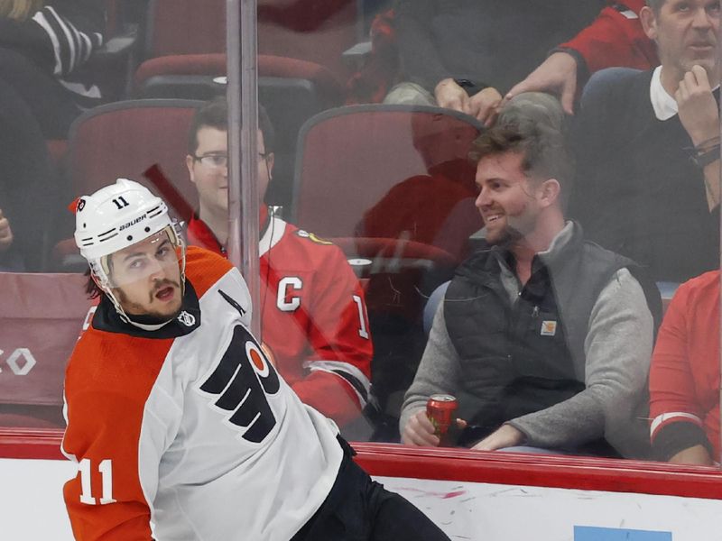 Feb 21, 2024; Chicago, Illinois, USA; Philadelphia Flyers right wing Travis Konecny (11) reacts after scoring against the Chicago Blackhawks during the second period at United Center. Mandatory Credit: Kamil Krzaczynski-USA TODAY Sports