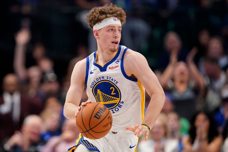 DALLAS, TEXAS - APRIL 05: Brandin Podziemski #2 of the Golden State Warriors controls the ball during the second half against the Dallas Mavericks at American Airlines Center on April 05, 2024 in Dallas, Texas. NOTE TO USER: User expressly acknowledges and agrees that, by downloading and or using this photograph, User is consenting to the terms and conditions of the Getty Images License Agreement. (Photo by Sam Hodde/Getty Images)