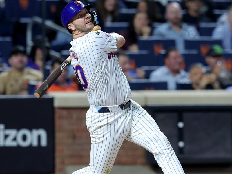 Sep 17, 2024; New York City, New York, USA; New York Mets first baseman Pete Alonso (20) follows through on a two run single against the Washington Nationals during the third inning at Citi Field. Mandatory Credit: Brad Penner-Imagn Images