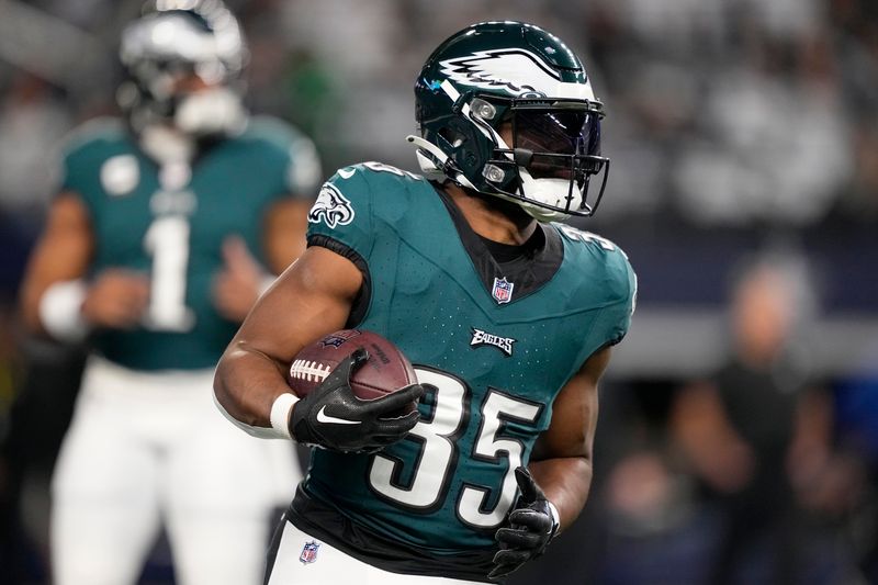 Philadelphia Eagles' Boston Scott warms up before an NFL football game against the Dallas Cowboys in Arlington, Texas, Sunday, Dec. 10, 2023. (AP Photo/Tony Gutierrez)