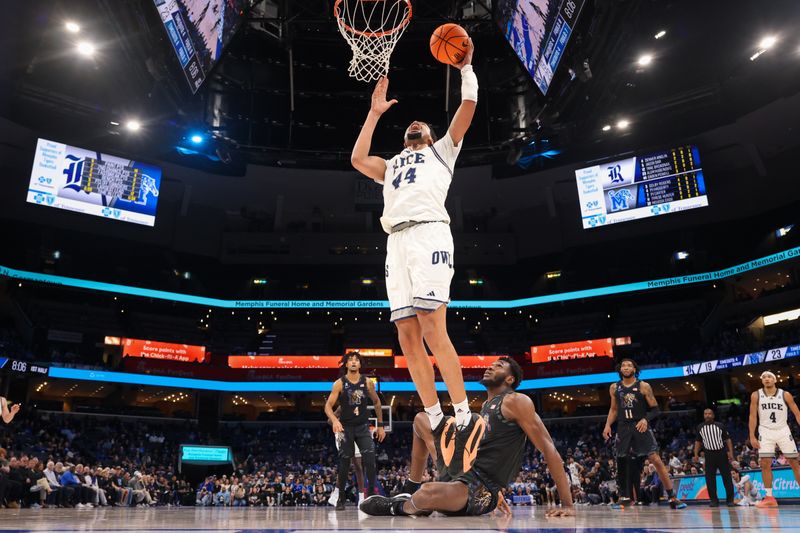 Feb 26, 2025; Memphis, Tennessee, USA; Rice Owls forward Caden Powell (44) shoots a layup against the Memphis Tigers during the first half at FedExForum. Mandatory Credit: Wesley Hale-Imagn Images
