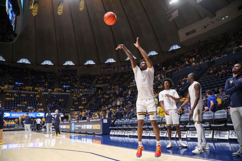 Feb 28, 2026; Morgantown, West Virginia, USA; West Virginia Mountaineers guard Honor Huff (3) warms up prior to their game against the BYU Cougars at Hope Coliseum. Mandatory Credit: Ben Queen-Imagn Images