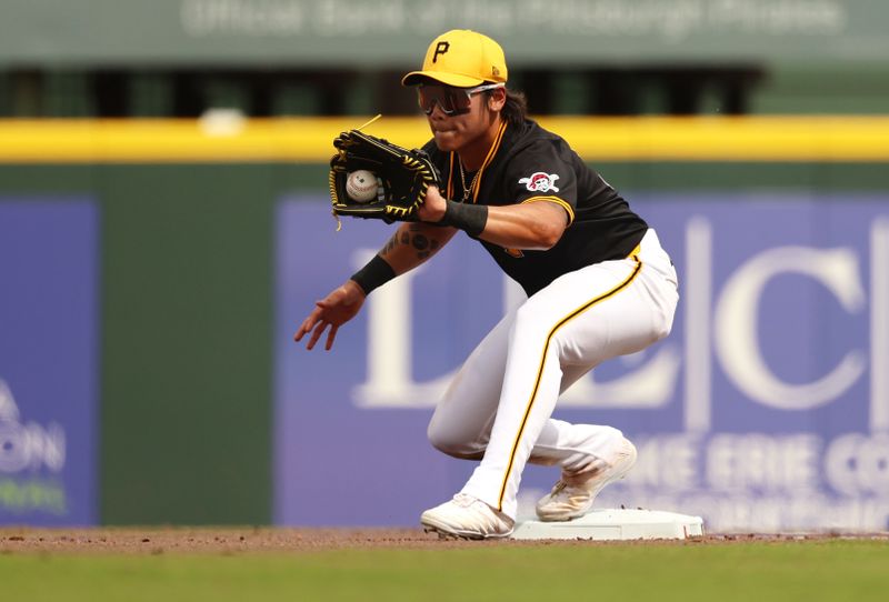 Mar 5, 2024; Bradenton, Florida, USA;  Pittsburgh Pirates infielder/outfielder Ji Hwan Bae (3) catches the ball for an out during the fourth inning against the Toronto Blue Jays at LECOM Park. Mandatory Credit: Kim Klement Neitzel-USA TODAY Sports