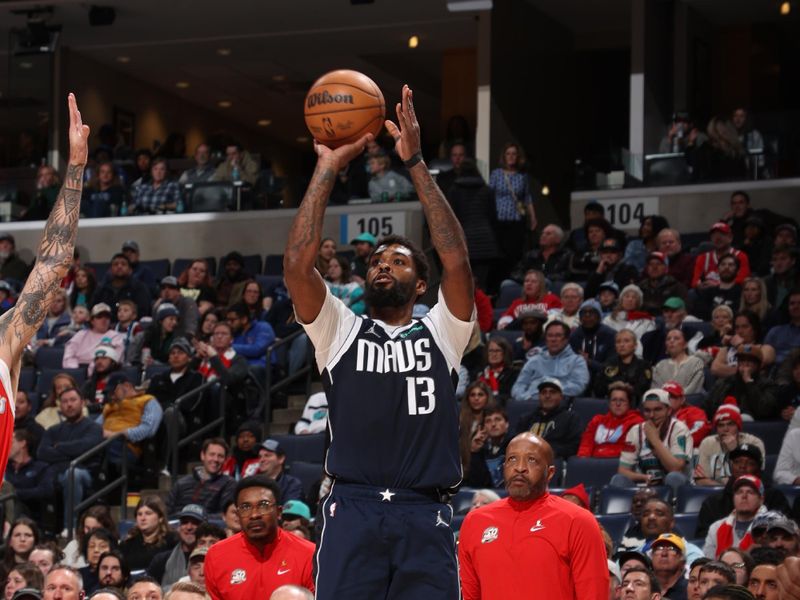 MEMPHIS, TN - JANUARY 6:  Naji Marshall #13 of the Dallas Mavericks shoots a three point basket during the game against the Memphis Grizzlies  on January  6, 2024 at FedExForum in Memphis, Tennessee. NOTE TO USER: User expressly acknowledges and agrees that, by downloading and or using this photograph, User is consenting to the terms and conditions of the Getty Images License Agreement. Mandatory Copyright Notice: Copyright 2024 NBAE (Photo by Joe Murphy/NBAE via Getty Images)