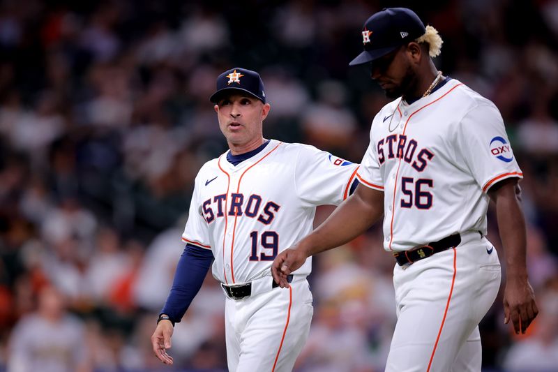 May 14, 2024; Houston, Texas, USA; Houston Astros manager Joe Espada (19) reacts after Houston Astros starting pitcher Ronel Blanco (56) is ejected prior to the fourth inning against the Oakland Athletics at Minute Maid Park. Mandatory Credit: Erik Williams-USA TODAY Sports