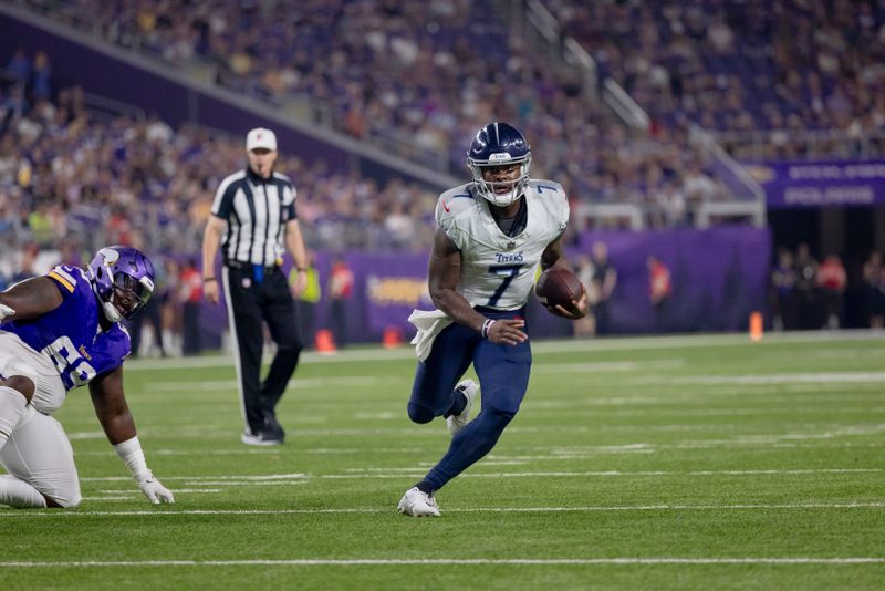 Tennessee Titans quarterback Malik Willis (7) in action during the first half of an NFL preseason football game against the Minnesota Vikings, Saturday, Aug. 19, 2023 in Minneapolis. Tennessee won 24-16. (AP Photo/Stacy Bengs)