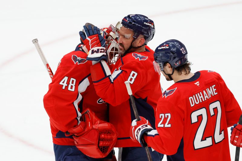 Mar 20, 2026; Washington, District of Columbia, USA; Washington Capitals left wing Alex Ovechkin (8) celebrates with Capitals goaltender Logan Thompson (48) after defeating the New Jersey Devils at Capital One Arena. Mandatory Credit: Amber Searls-Imagn Images