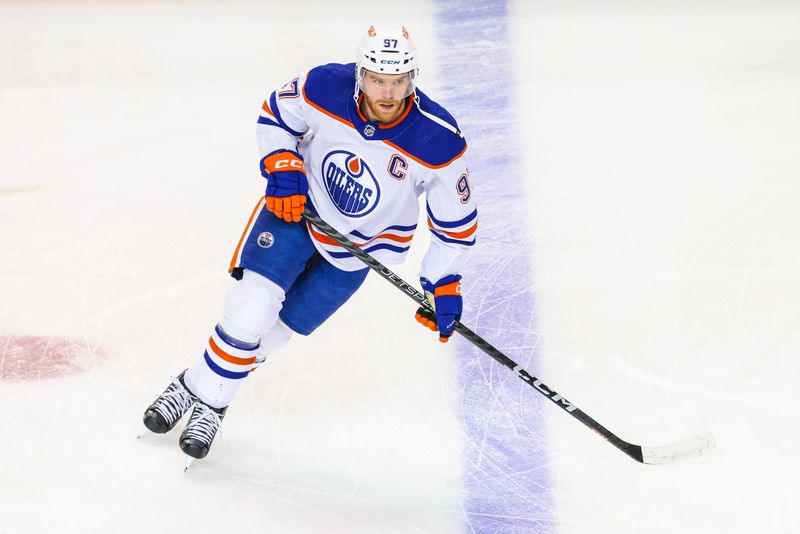 Apr 6, 2024; Calgary, Alberta, CAN; Edmonton Oilers center Connor McDavid (97) skates during the warmup period against the Calgary Flames at Scotiabank Saddledome. Mandatory Credit: Sergei Belski-USA TODAY Sports