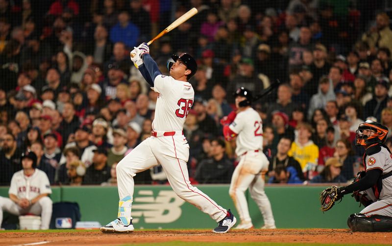 Apr 10, 2024; Boston, Massachusetts, USA; Boston Red Sox first base Triston Casas (36) hits a two run home run against the Baltimore Orioles in the fifth inning at Fenway Park. Mandatory Credit: David Butler II-USA TODAY Sports