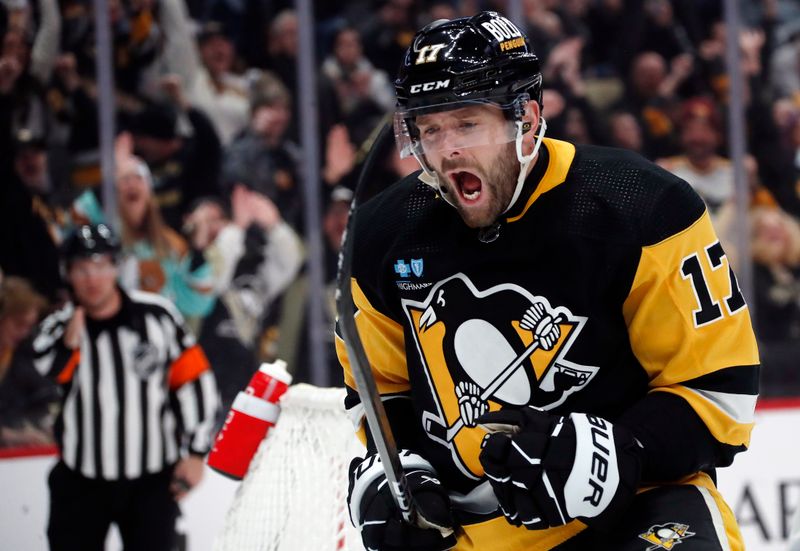 Feb 25, 2024; Pittsburgh, Pennsylvania, USA;  Pittsburgh Penguins right wing Bryan Rust (17) reacts after scoring his second goal of the game against the Philadelphia Flyers during the second period at PPG Paints Arena. Mandatory Credit: Charles LeClaire-USA TODAY Sports